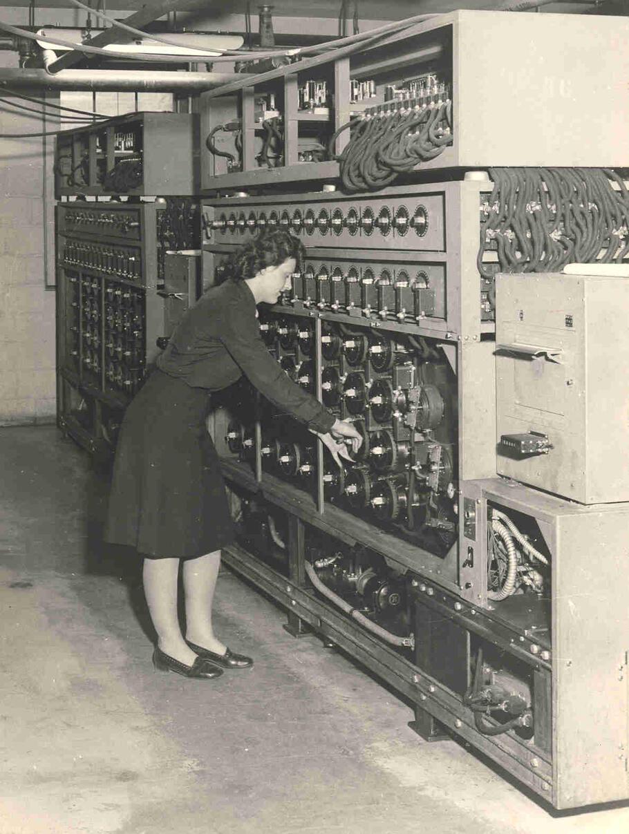 a woman using the bombe, one of the first computers, more details below